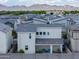 View of a backyard with a covered patio seating area surrounded by a block wall, with mountain views in the background at 1901 W 23Rd Ave, Apache Junction, AZ 85120