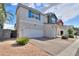 Stylish two-story home features a two-car garage and desert landscaping, offering charm and convenience at 1901 W 23Rd Ave, Apache Junction, AZ 85120