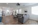 Open-concept living room with view of the kitchen, recessed lighting, and tile flooring at 1901 W 23Rd Ave, Apache Junction, AZ 85120