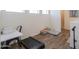 Brightly lit loft space featuring a desk, exercise equipment, and toys at 1901 W 23Rd Ave, Apache Junction, AZ 85120