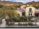 Beautiful home exterior with a charming facade, well-manicured landscaping, and mountain views at 20299 N 102Nd Pl, Scottsdale, AZ 85255