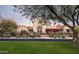 Stunning home featuring a balcony and lush landscaping with beautiful bougainvillea along the front steps at 20299 N 102Nd Pl, Scottsdale, AZ 85255