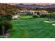 Lush green golf course featuring sand traps and mature trees in a picturesque setting at 20299 N 102Nd Pl, Scottsdale, AZ 85255