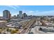 City aerial view showcasing building parking, surrounding community, and mountain range at 207 W Clarendon Ave # H10, Phoenix, AZ 85013