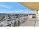 Balcony view showcasing the city skyline on a sunny day with white railing at 207 W Clarendon Ave # H10, Phoenix, AZ 85013