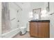 Bathroom featuring a shower/tub combo, a toilet, and a modern vanity at 207 W Clarendon Ave # H10, Phoenix, AZ 85013