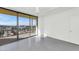 Sunlit bedroom featuring large windows and an open floor plan at 207 W Clarendon Ave # H10, Phoenix, AZ 85013