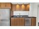 Well-equipped kitchen with stainless steel appliances and modern cabinetry at 207 W Clarendon Ave # H10, Phoenix, AZ 85013