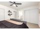 Serene bedroom with neutral tones and wood-look floors creates a relaxing retreat at 2142 E Palmcroft Dr, Tempe, AZ 85282