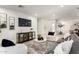 Cozy living room featuring a comfortable sofa, stylish decor, and a television at 2142 E Palmcroft Dr, Tempe, AZ 85282