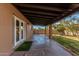 Covered patio with brick support pillars and wood ceiling provides outdoor living space at 2142 E Palmcroft Dr, Tempe, AZ 85282