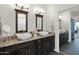 Bathroom vanity with double sinks and granite countertop at 22211 N 51St St, Phoenix, AZ 85054