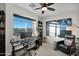 Well-lit home office with modern desk and chair at 22211 N 51St St, Phoenix, AZ 85054