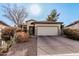 Charming single-story home featuring desert landscaping and an attached two-car garage at 22288 S 214Th S St, Queen Creek, AZ 85142