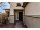 Inviting front entrance with decorative security door and desert landscaping at 22288 S 214Th S St, Queen Creek, AZ 85142