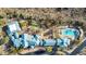 Aerial view of community pool and clubhouse, bocce ball court, and desert landscaping at 227 W Lantern Way, San Tan Valley, AZ 85143