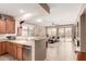 Open-concept living area connects the kitchen and living room, creating a spacious atmosphere at 227 W Lantern Way, San Tan Valley, AZ 85143