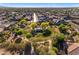 Aerial view of the community park with lush greenery and walking paths throughout the neighborhood at 23004 E Desert Spoon Dr, Queen Creek, AZ 85142