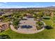 Aerial view of community basketball court with manicured landscaping and mountain views at 23004 E Desert Spoon Dr, Queen Creek, AZ 85142