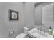 Bathroom with a white sink and toilet at 23004 E Desert Spoon Dr, Queen Creek, AZ 85142