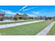 The Meadows bocce ball court showcasing manicured lawns and a view of the community clubhouse at 23072 N 98Th N Dr, Peoria, AZ 85383