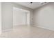 Open-plan living room with ceramic tile floors and recessed lighting at 23072 N 98Th N Dr, Peoria, AZ 85383