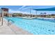 Community pool featuring shallow entry and wading area with chairs at 23072 N 98Th N Dr, Peoria, AZ 85383