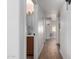 Hallway featuring tiled floors and leading to a bedroom and bathroom at 2671 W Bentrup St, Chandler, AZ 85224