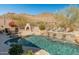 Backyard pool and spa offers a relaxing retreat with desert views at 27561 N 84Th Dr, Peoria, AZ 85383