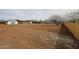 Large vacant lot with fencing, offering an opportunity for a new home or development at 2923 E Wahalla Ln, Phoenix, AZ 85050