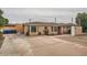 Inviting home exterior with desert landscaping, spacious driveway, and well-maintained curb appeal at 2929 N 55Th Pl, Phoenix, AZ 85018