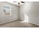 Cozy bedroom with ceiling fan and neutral color palette at 29909 N Yucca Dr, Florence, AZ 85132