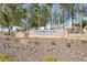 Magma Ranch community entrance with well-maintained landscaping and clear signage at 29909 N Yucca Dr, Florence, AZ 85132