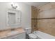 Bathroom with a tiled shower, bathtub, and updated vanity with granite countertop at 3117 W Corrine Dr, Phoenix, AZ 85029