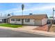 Inviting single-story home with a manicured lawn, desert landscaping and attached garage at 3117 W Corrine Dr, Phoenix, AZ 85029