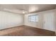 Living room boasts hardwood-style floors, light-colored walls, and bright natural light at 3117 W Corrine Dr, Phoenix, AZ 85029