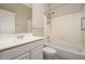 Simple bathroom with a tub shower combo, bright vanity, and modern mirror at 3131 E Legacy Dr # 2101, Phoenix, AZ 85042