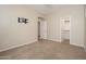 A neutral bedroom featuring carpet, a ceiling fan, and walk in closet at 3131 E Legacy Dr # 2101, Phoenix, AZ 85042