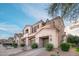 Townhome exterior showcasing modern architecture, private balconies, and two-car garages at 3131 E Legacy Dr # 2101, Phoenix, AZ 85042