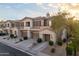 Beautiful exterior townhome featuring a private garage and second-story balcony at 3131 E Legacy Dr # 2101, Phoenix, AZ 85042