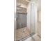 Modern shower with mosaic tile accents and a seamless glass enclosure, combining style and functionality at 3131 E Legacy Dr # 2101, Phoenix, AZ 85042