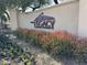 Signage for The Legacy Golf Resort with lush flowerbeds at 3131 E Legacy Dr # 2101, Phoenix, AZ 85042