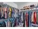 Walk-in closet featuring ample storage and custom shelving at 31400 N 130Th Ave, Peoria, AZ 85383