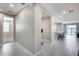 Hallway that provides a view to the kitchen and living room at 31400 N 130Th Ave, Peoria, AZ 85383