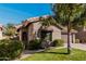 Charming home featuring desert landscaping, a tile roof, and an attached two-car garage at 3238 E Ashurst Dr, Phoenix, AZ 85048