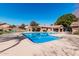 Community pool with ample lounging, blue sky, and inviting water at 3238 E Ashurst Dr, Phoenix, AZ 85048