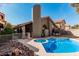 Inviting backyard with a private pool, spa, and comfortable seating area at 3238 E Ashurst Dr, Phoenix, AZ 85048