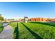 Exterior view of Irene de Los Lagos Elementary School with a green lawn at 3238 E Ashurst Dr, Phoenix, AZ 85048