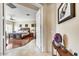 Spacious main bedroom with wood floors, ceiling fan, shuttered windows, and ensuite at 34014 N 43Rd St, Cave Creek, AZ 85331