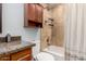 Bathroom with granite counters and a shower/tub combination at 3503 E Campo Bello Dr, Phoenix, AZ 85032